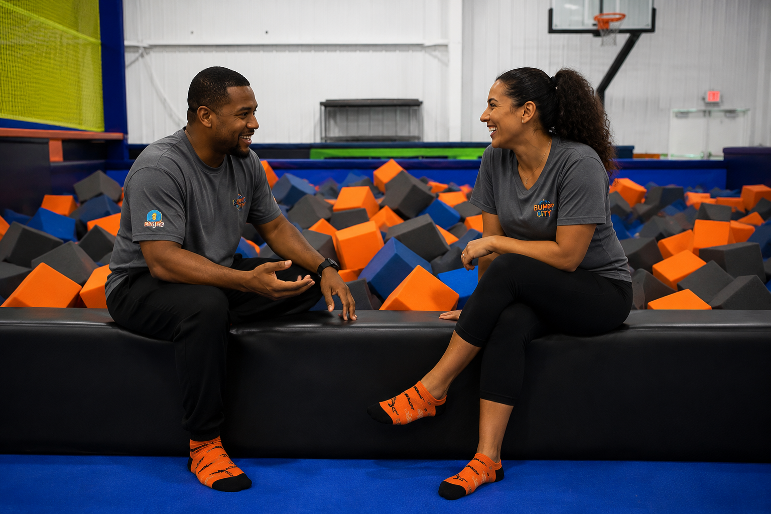 Two professionals in conversation at Bump City